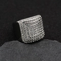 Silver 316 stainless steel four-row iced out hip hop ring on a textured rock - US 7 / Steel