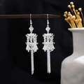 Vintage silver hollow ball earrings with long tassel detail in Bohemian ethnic style - Multi-layer Hollow Spherical Tassel Style (E5008-5)