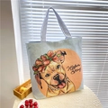 Blue canvas tote bag with floral dog print and striped handles for spring - Pastoral Dog