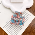 Blue acetate hair claw clip with pink marble texture for elegant daily hair styling - Rising Sun Pattern