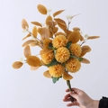 Artificial yellow pompon mum bouquet with vintage eucalyptus leaves held by hand - Autumn Yellow