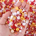 Detailed view of mixed flatback pearls and resin rhinestones for DIY nail art and crafts - Half-circle Pearl Yellow White And Red Series #a10 / 30 g