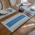 Blue and white woven cotton placemats with fringe details on dark wooden dining table - Sky Blue