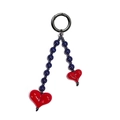 Close-up of blue beaded charm with red heart pendants and black metal ring clasp - Red Heart/Deep Blue Beads/Black Ring