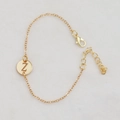 Golden delicate chain bracelet featuring a circular镂空 cutout charm with the letter Z - Gold Z