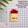 Miniature resin vegetable bag magnet showing cherry tomatoes in a yellow paper sack - With Magnet / Tomato