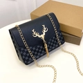 Classic black crossbody chain bag featuring golden deer head emblem and tassel detail - Black Printed