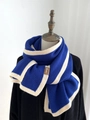 Blue and white striped knit scarf with premium leather brand label on a mannequin - 180cm / Blue