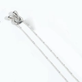 Minimalist silver balloon bubble pendant necklace with elegant metal texture on white - Letter R