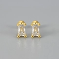 Close-up of gold screw stud earrings featuring rectangular clear crystals in a 4-prong setting - Rectangular Screw Back / White Zirconia Yellow Gold