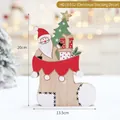 Christmas wooden stocking ornament featuring Santa and tree, 20cm festive table decoration - Christmas Stocking with Santa