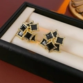 Orecchini vintage geometrici neri e oro con finitura metallica a grana stratificata - 46# Perno in Argento