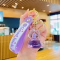 Purple unicorn liquid quicksand keychain with acrylic astronaut charm and wrist strap - Unicorn Drifting Bottle-Purple