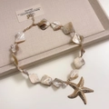 Multilayer necklace with pink stones, gold starfish pendant and natural shell beads - Starfish Pendant Necklace O-02