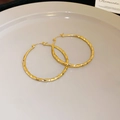 Minimalist golden twist hoop earrings with textured metal design for women - Twisted Wave Gold - Large