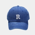 Detailed close-up of vintage washed navy cotton fabric and white R letter embroidery - Adjustable / Dark Blue