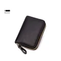 Detail of black lychee grain leather RFID card holder with a gold metal zipper closure - Black