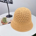 Close-up of the hollow woven texture and breathable pattern on the beige bucket hat - M (56-58cm) Adjustable / Khaki