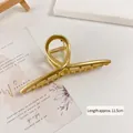 Elegant 11.5cm gold matte metal hair claw clip with minimalist twisted design for women - Large Solid Cross Gold