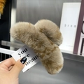 Detail of plush faux fur hair claw clip in brown stripes with fluffy texture - Extra Large / Coffee Leopard