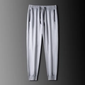Pantalones deportivos gris claro para hombre con cintura elástica y bolsillos con cremallera - L / Gris Claro / Pierna Con Puño