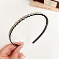 Black non-slip headband with iridescent rhinestones and twisted braid design detail - AB Color