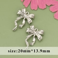 Silver bow-knot 20mm*13.9mm pendant charm for DIY jewelry making in bright metallic finish - ME5608B - Silver Bow Knot - 1pc