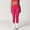 High-waist seamless yoga pants in bright pink for fitness and outdoor running gym wear - Raspberry Red