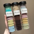 Three tubes of high-elasticity braided hair ties in assorted pastel and earthy colors - Macaron + Coffee + Spring (300 Pcs/Can)