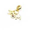Detailed close-up of a gold MOM letter pendant with a pink heart zircon and beaded bail - MOM Heart Pink Zirconia