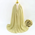 Grass green pearl chiffon scarf on mannequin with detailed fabric texture macro view - Grass Green