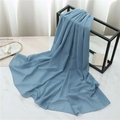 Detail shot of light blue pearl chiffon scarf on white marble with soft lighting - 175cmx70cm / Haze Blue