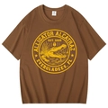 T-shirt marron à col rond avec motif Alligator Alcatraz jaune sur le devant - Café