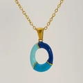 Gold-plated letter O pendant necklace featuring blue enamel detailing on a fine chain - Blue Gradient Enamel Letter O