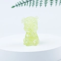 Mini Schnauzer dog figurine in lime green crystal resin on a white display stand - 09 Lemon Citrine