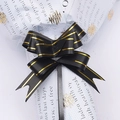 Decorative black bow with gold edges and support stick for gift wrapping and floral decor - Black Gold Edge