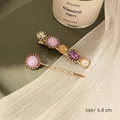 Set of two vintage pearl hair clips with purple crystals and gold metal finish - Lavender Purple Gem Combo