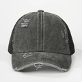 Close-up of distressed washed denim baseball cap with mesh back and torn edge details - One Size / Black