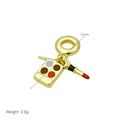 Detail of 27mm gold makeup charms showing lipstick and enamel palette, weight 2.9g - Cosmetics Set Charm