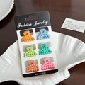 Set of 6 mini macaron hair claws in assorted pastel colors on display card - Set 11