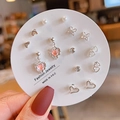 Macro view of 6-piece silver earring set with heart pearls and crystal studs details - Silver Gradient Heart (E0261-1)