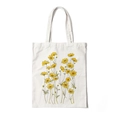 Off-white canvas tote bag featuring a hand-drawn yellow floral cosmos print design - Style K-Yellow Cosmos