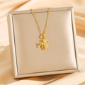 Elegant gold titanium steel bamboo pendant necklace with micro-pave diamonds on display - Gold Micro Pave Bamboo (8092)