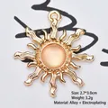 Detailed view of a golden sun flower pendant with orange stone for DIY jewelry making - Jelly Pink