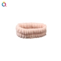 Close-up of pink coral fleece headband with soft vertical striped texture for face washing - Single Headband / Pink