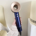 High-speed bladeless hair dryer in deep blue and gold finish, handheld ergonomic design - Blue Gold
