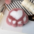 Detailed view of pink and white plush kitten paw keychain with golden metal ring - Dusty Pink