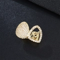 Iced out gold hip hop tooth cap with heart arrow design and sparkling white cubic zirconia - Heart / Gold