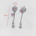 Detail shot of heart pendant charm with pink crystal and star tassel for DIY jewelry - Pink Heart Tassel