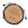 Dettaglio del bracciale con perline codice Morse, pietre nere e carta messaggio - A mio fratello